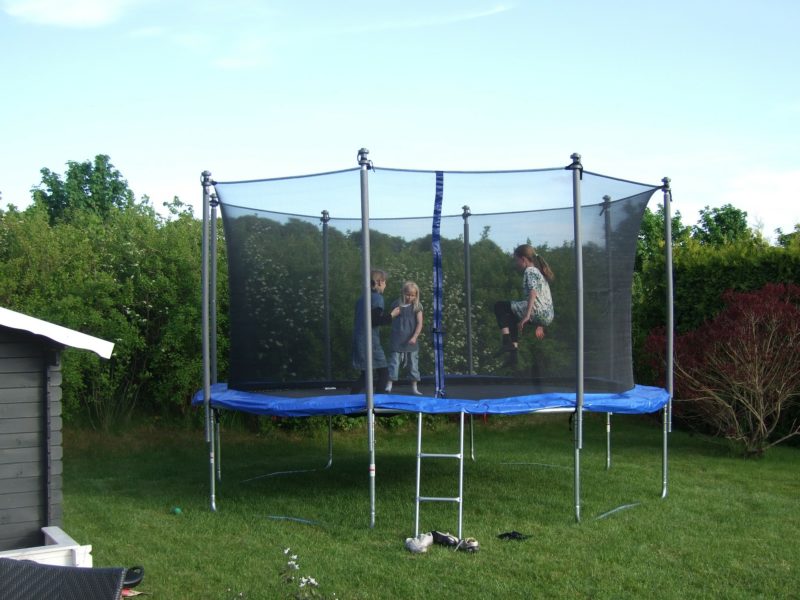 kids jumping on trampoline